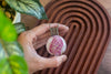 Crisscross Sterling Silver Pendant with Swirling Pink Fused Glass Cabochon