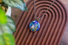 Copper Wire Wrapped Pendant with Swirled Blues and Green Fused Glass