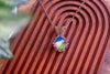 Blue, White, and Green Fused Glass and Copper Wire Teardrop Pendant