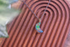 Iridescent Blue and Green Crescent Moon Pendant with Copper Wire Wrapping