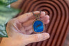 Copper Wire Wrapped Pendant with Dragonfly on Streaked Blue Glass